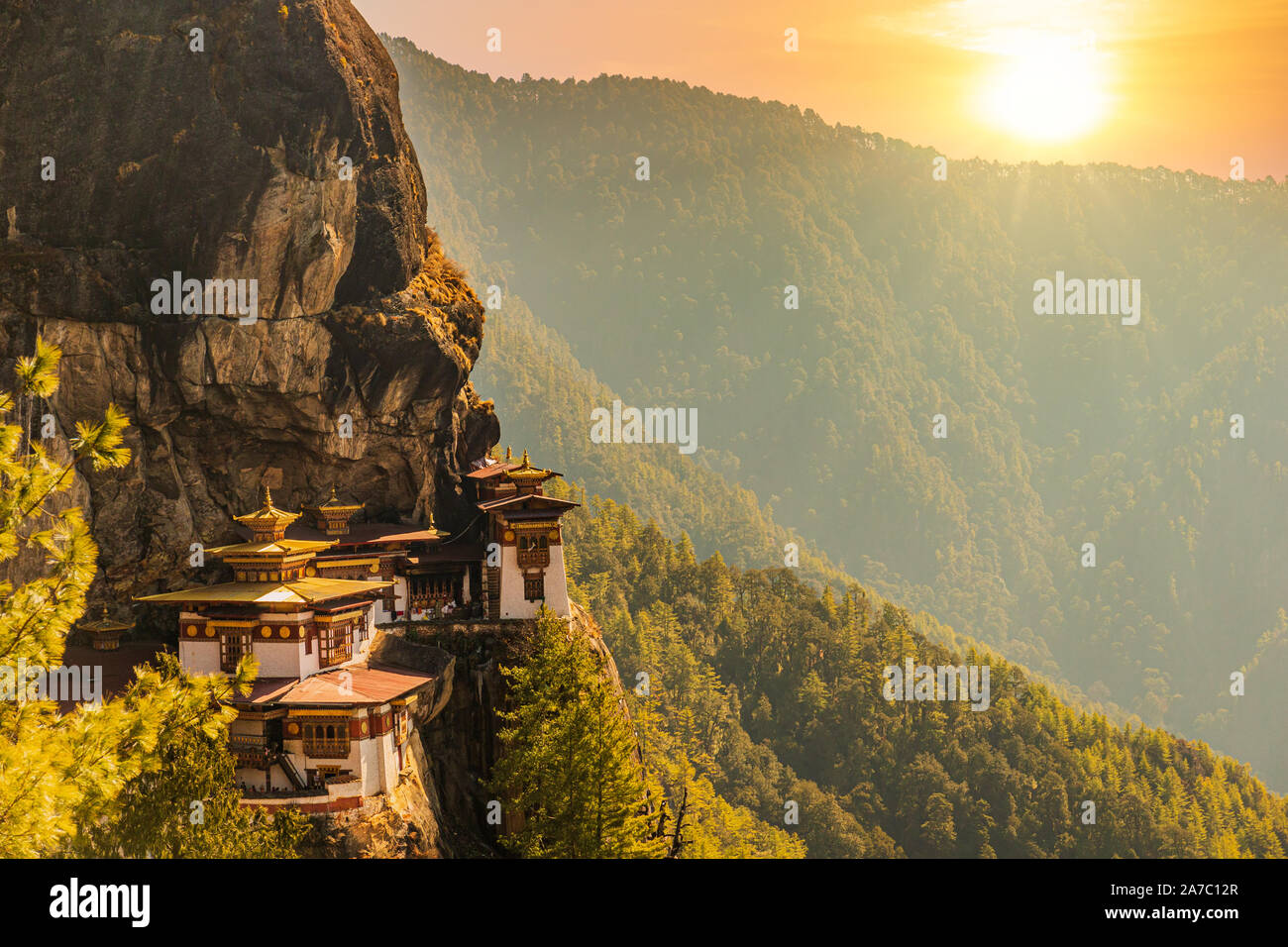 Sunset at Tiger's nest Temple or Taktsang Palphug Monastery (Bhutan) Stock Photo