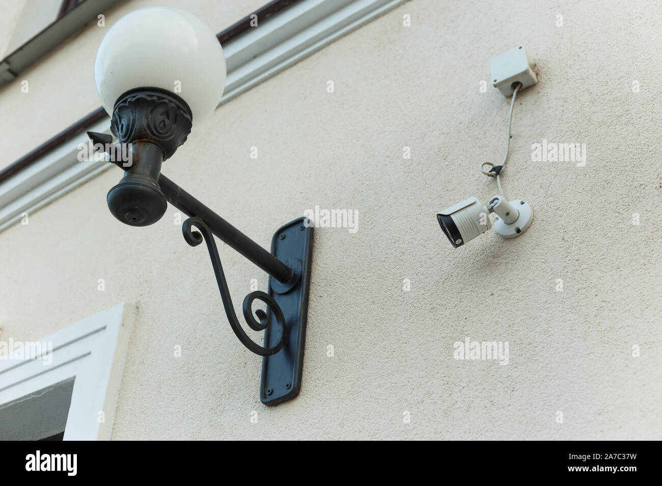 Outdoor surveillance camera on the facade of the building. The concept