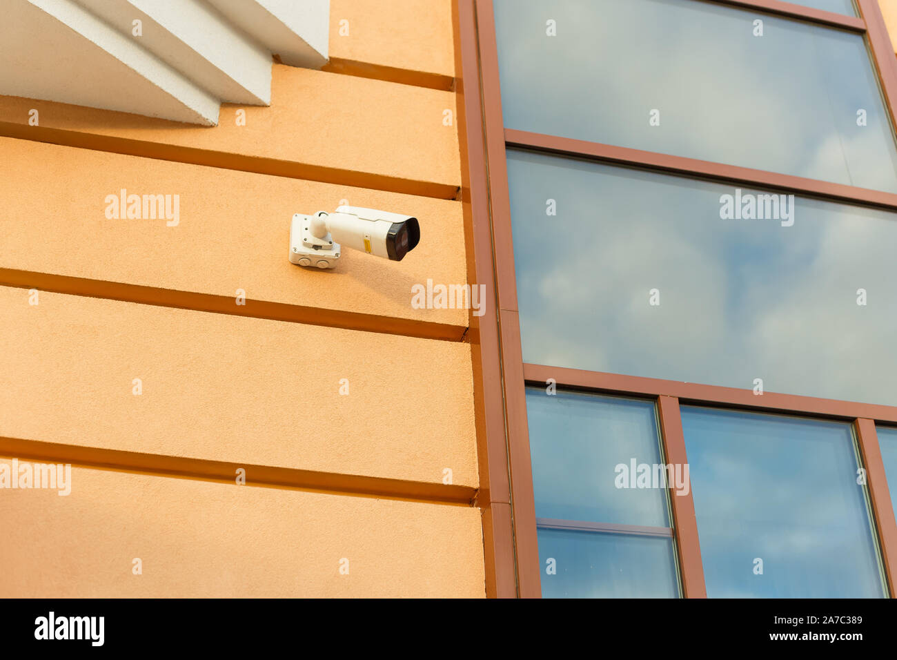Outdoor surveillance camera on the facade of the building. The concept