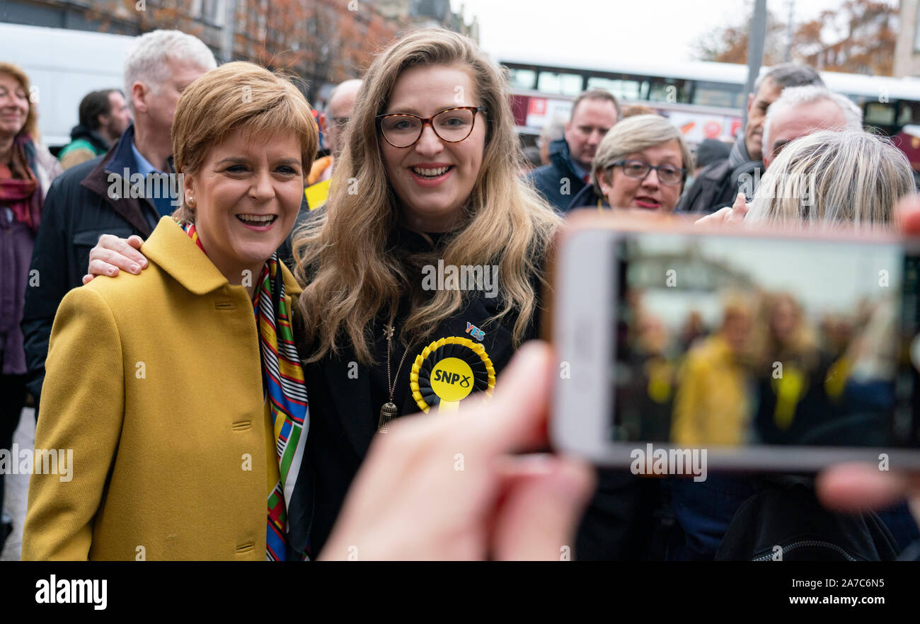 Leith, Edinburgh, Scotland, UK. 1st November 2019. Scottish First Minister Nicola Sturgeon joined Deidre Brock, the SNPÕs candidate for Edinburgh North and Leith, on the campaign trail today in Leith, Edinburgh. She told party activists that the General Election is ScotlandÕs chance to escape the Brexit chaos by voting SNP and putting ScotlandÕs future in ScotlandÕs hands. Pictured. Selfie with Nicola Sturgeon. Iain Masterton/Alamy Live News. Stock Photo