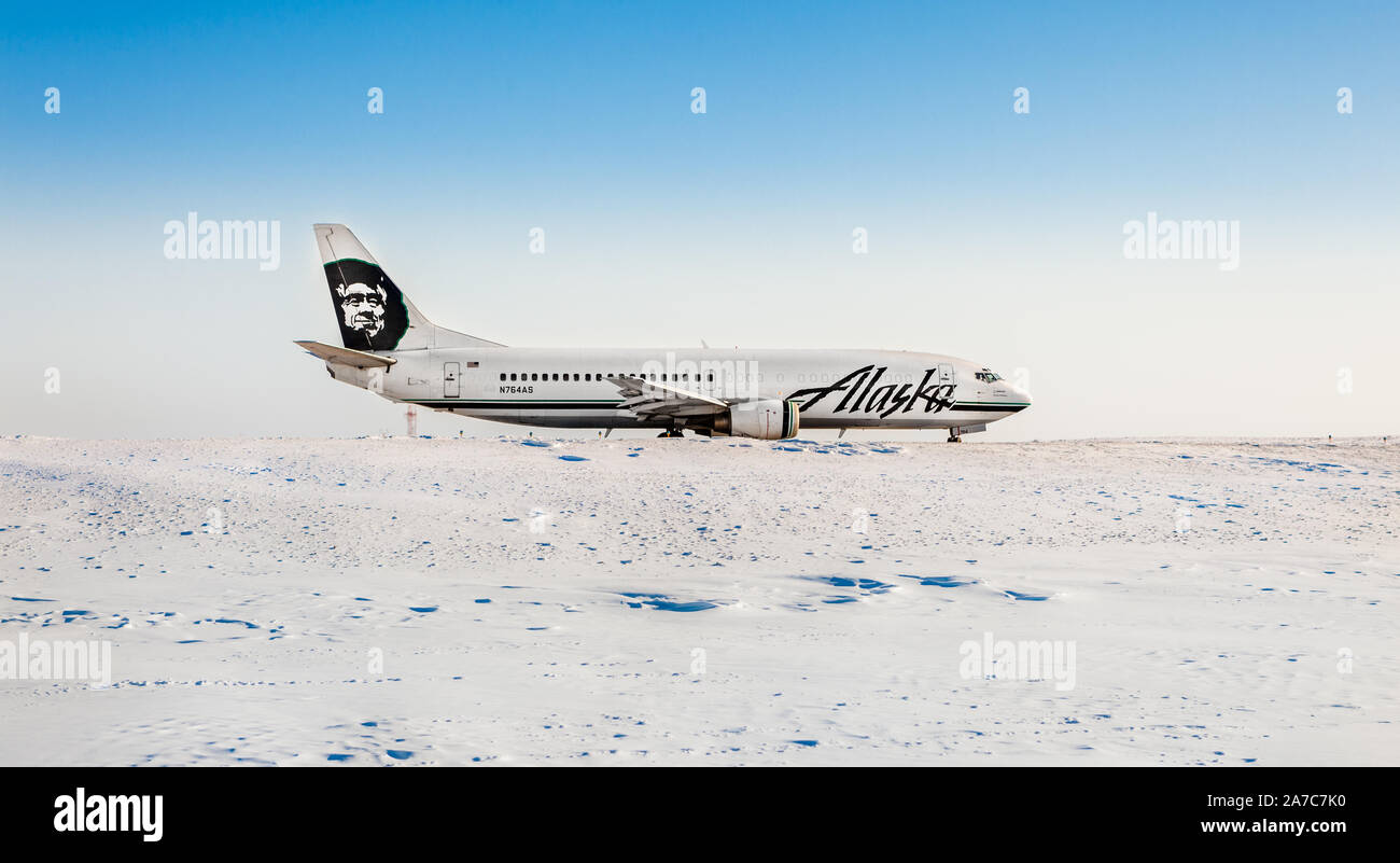 Alaska Airline CombiJet at the edge of the runway in the arctic. Kotzebue, Alaska Stock Photo