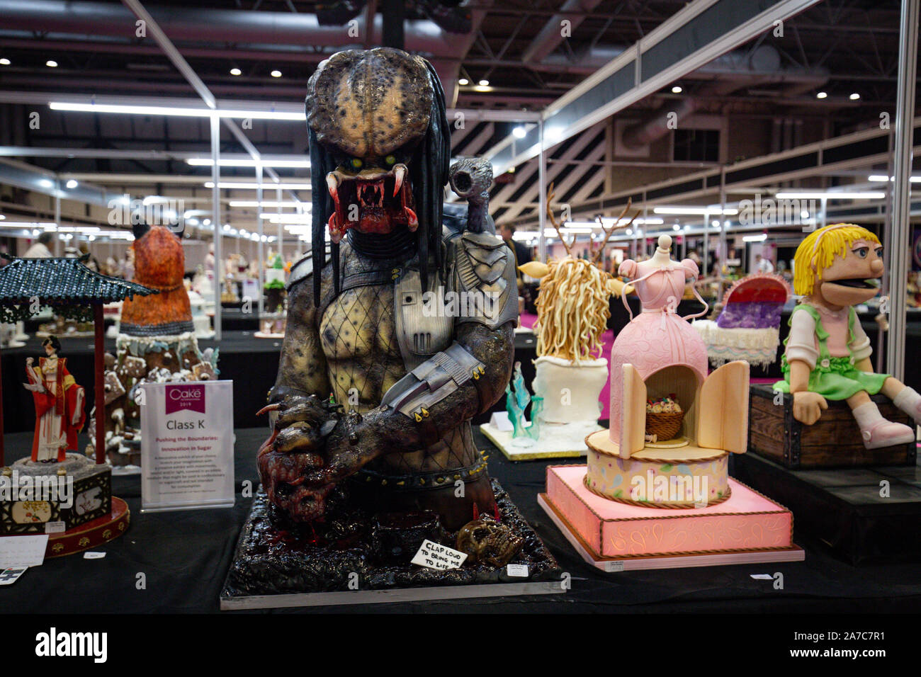 Cakes, including a 'Predator' entry, competing in the Pushing the Boundaries category at Cake International 2019 at the NEC, Birmingham. Stock Photo