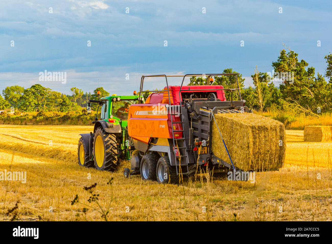 Harvesting Barley near  Portsoy in Aberdeenshire Scotland Stock Photo