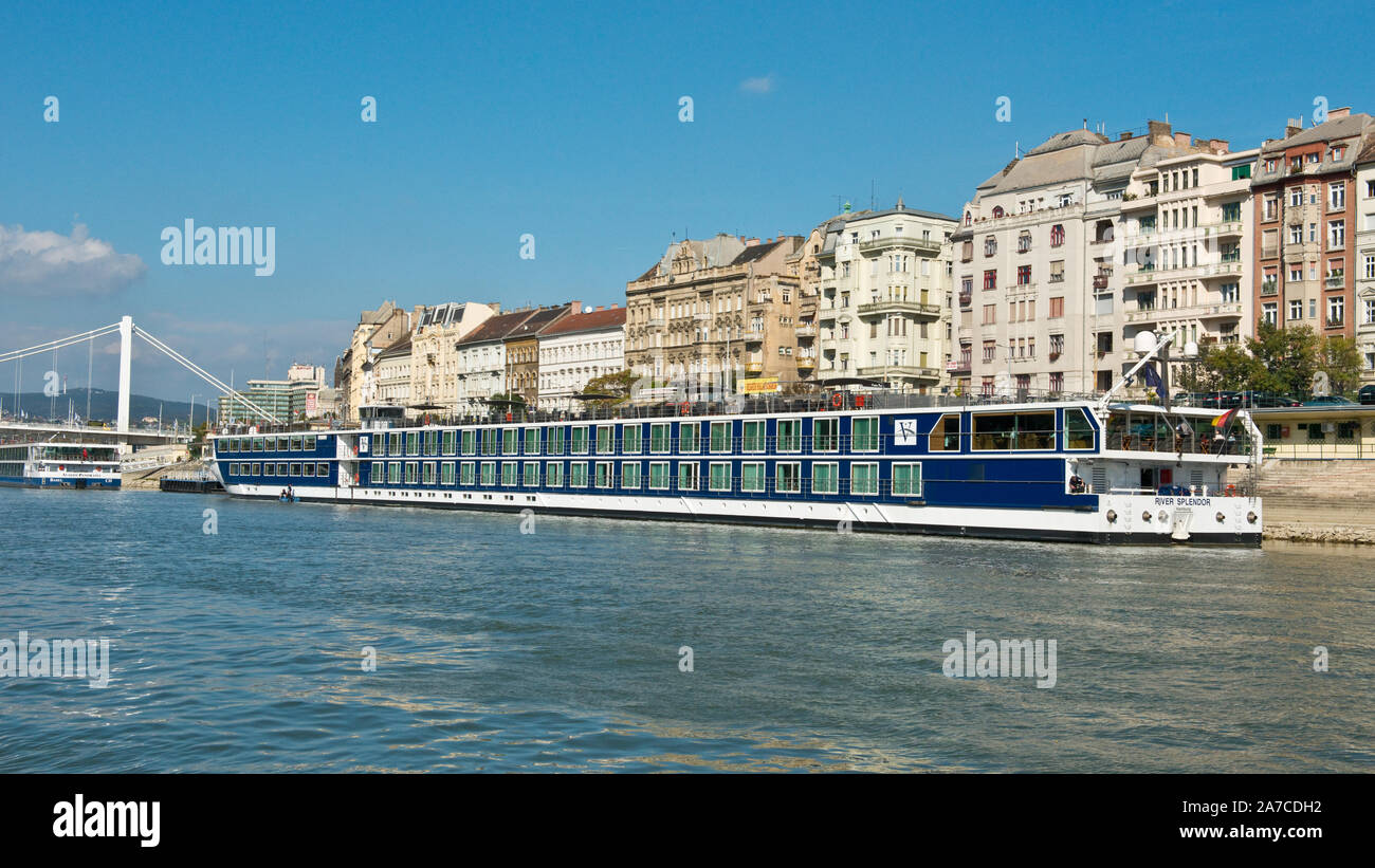 International river cruise boats moored against Pest embankment near Elizabeth Bridge. Budapest. Stock Photo