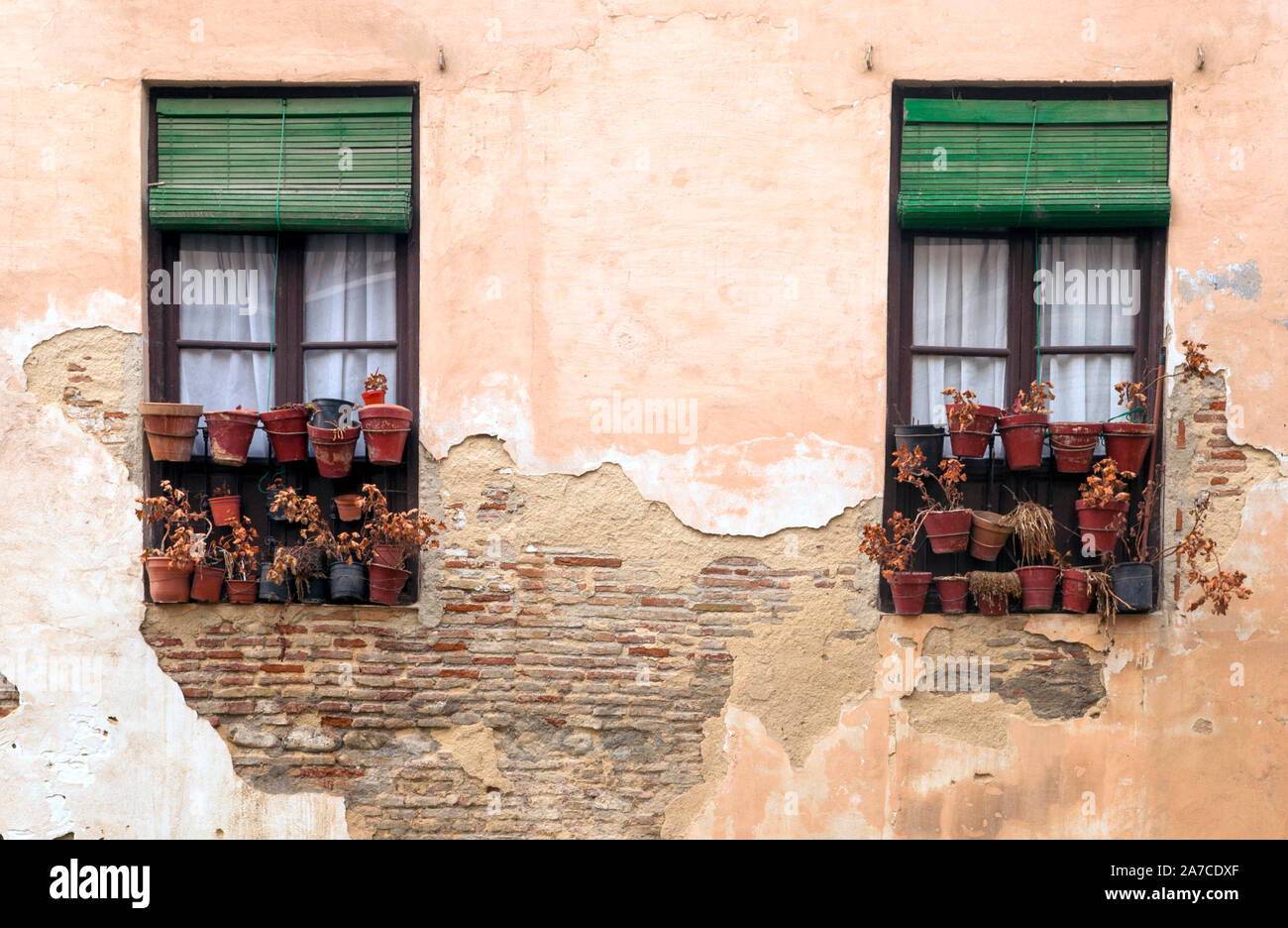 Louvered windows on the facade of an old house Stock Photo Alamy