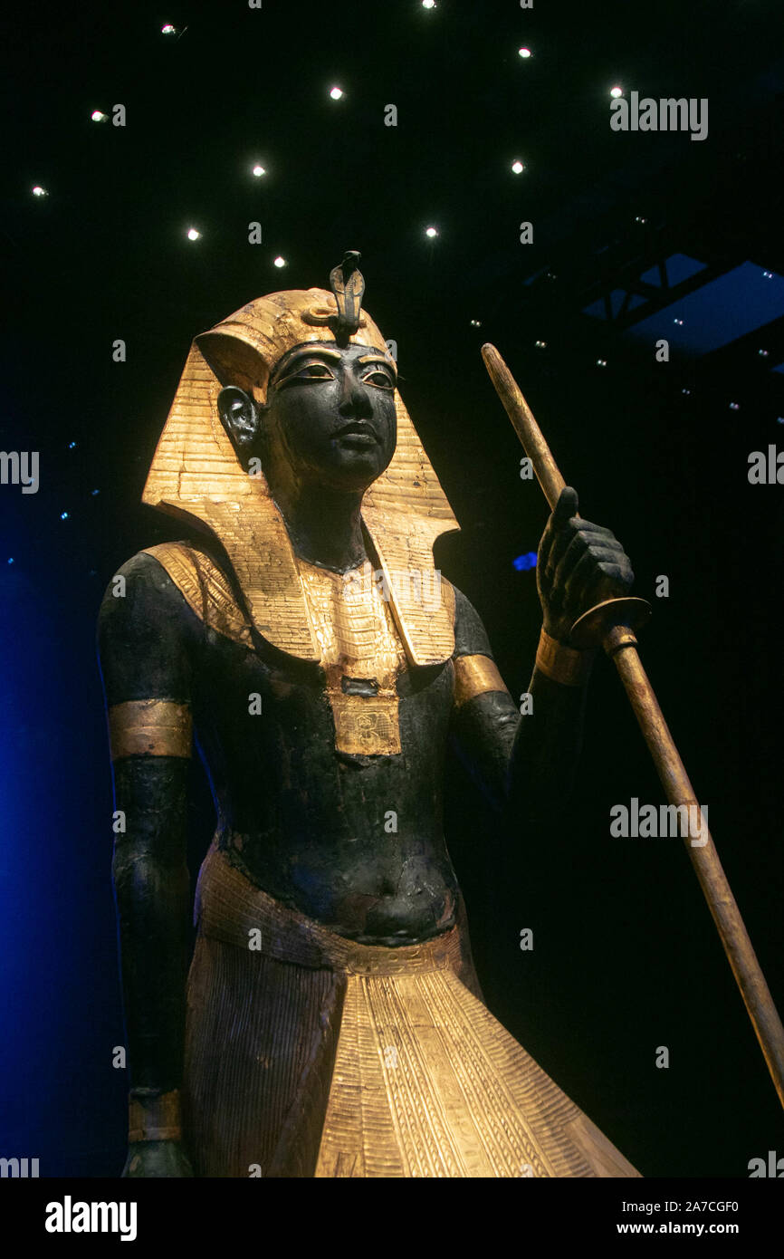 Saatchi Gallery London, UK. 1 November 2019. Gilded Wooden Statue of Ptah wears a cobalt-blue glass skullcap. Reign of Tutankhamun 1336-1326 BC. Grand Egyptian Museum.   A preview  featuring the largest collection of 60 of   treasures  and original artifacts from Tutankhamun's tomb ever to leave Egypt. The exhibition at the Saatchi Gallery will run from 2 November until 3 May 2020. amer ghazzal /Alamy live News Stock Photo