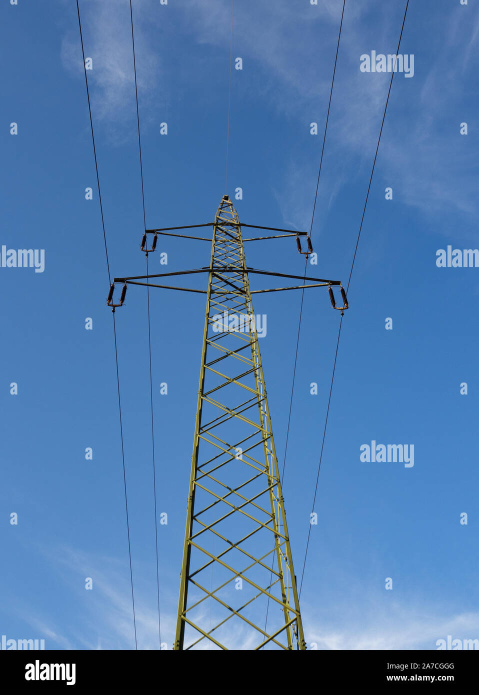 Electricity pylon and blue sky and clouds Stock Photo - Alamy