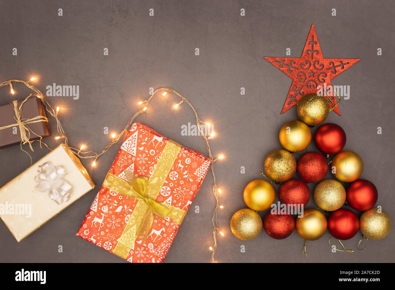 Christmas decoration with Christmas tree made of red and gold balls and ...