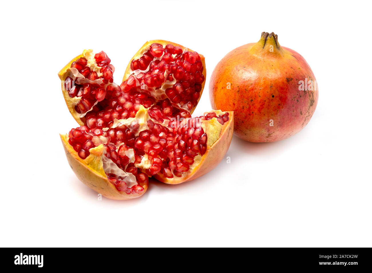 White pomegranate (Punica granatum) on a white background Stock Photo