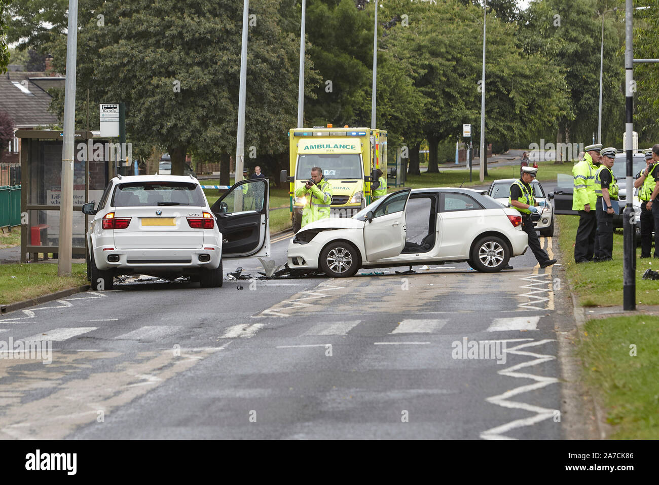 28th July 2016 - Emergency services attend a serious road traffic accident, RTA, following an head on car crash in West Hul, East Yorkshire, UK. Stock Photo