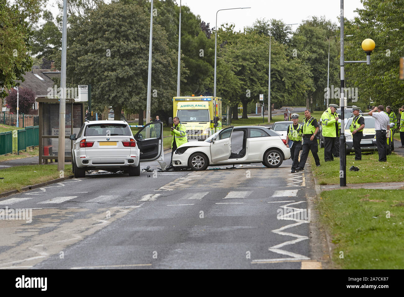 28th July 2016 - Emergency services attend a serious road traffic accident, RTA, following an head on car crash in West Hul, East Yorkshire, UK. Stock Photo