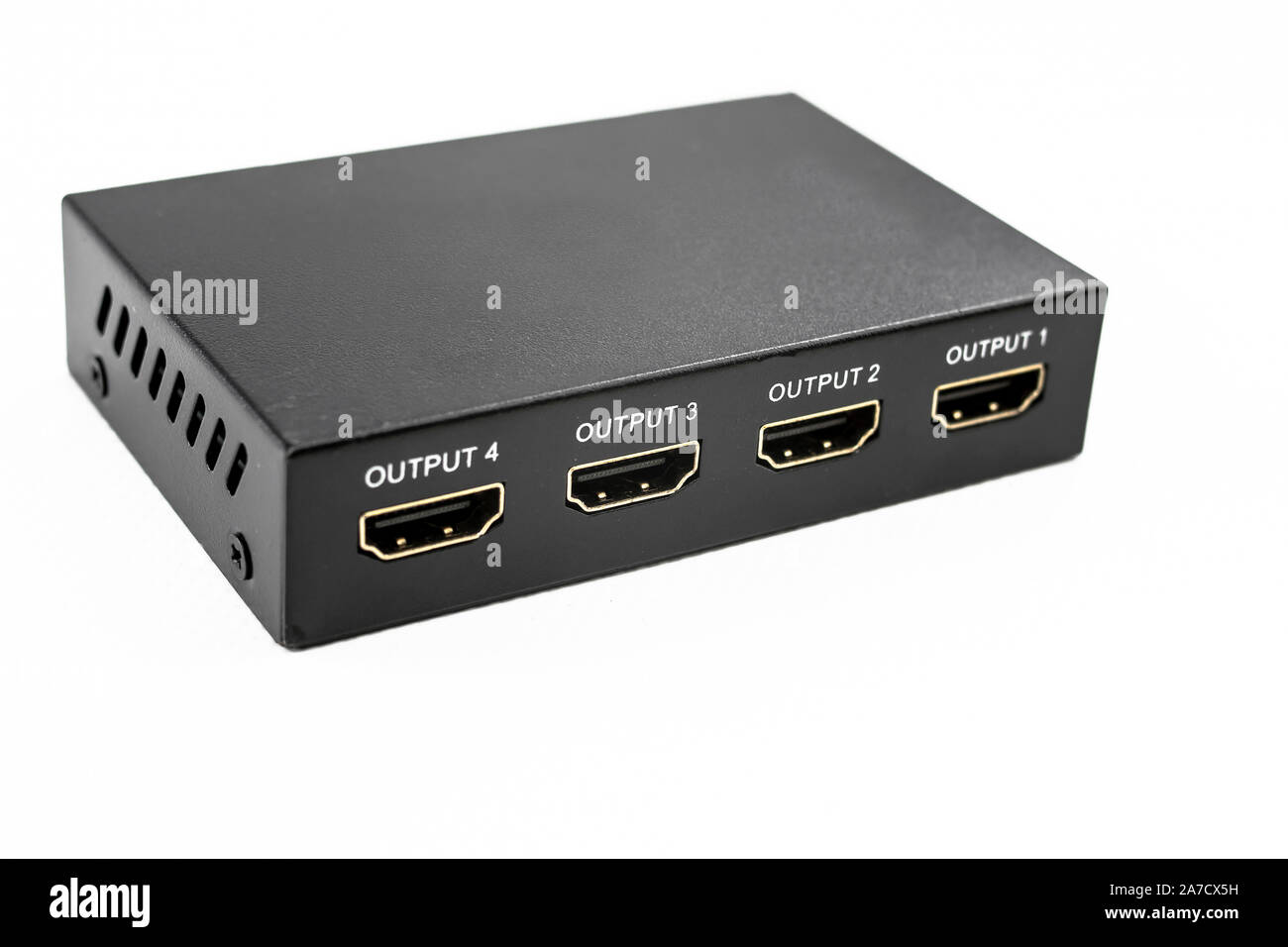 HDMI signal splitter to multiply an audio and video signal with up to four target devices. Stock Photo
