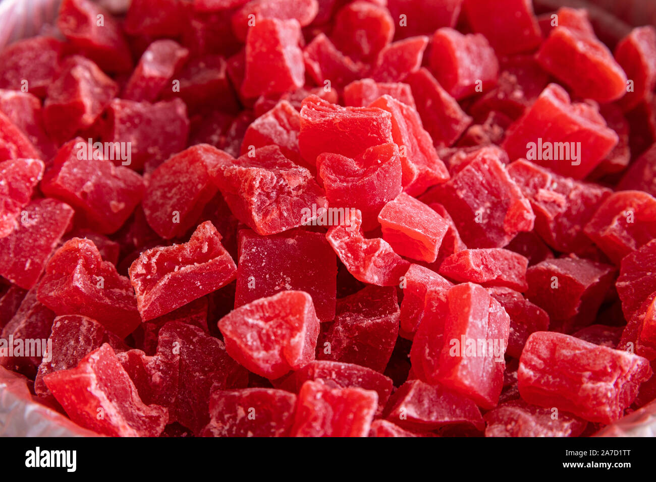 Red sweet dry fruits, dried fruit closeup on market shelf Stock Photo