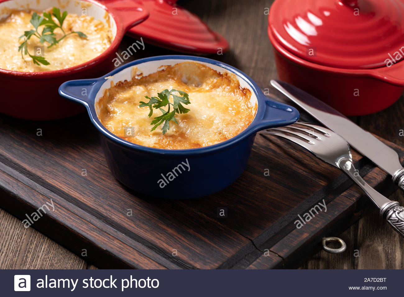 Baked Mushroom Julienne With Chicken And Cheese In Pots Stock Photo Alamy
