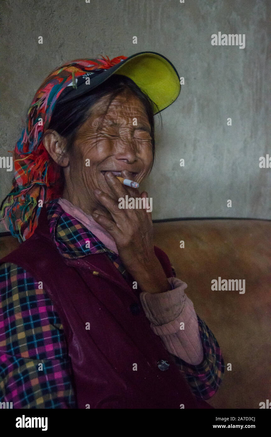 Yi Woman Portrait of a Yi Woman, Shangri-La,Yunnan, China Stock Photo - Alamy