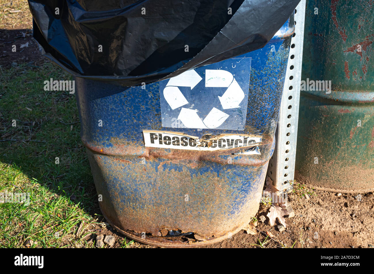 blue metal recycling trash can in North America Stock Photo Alamy