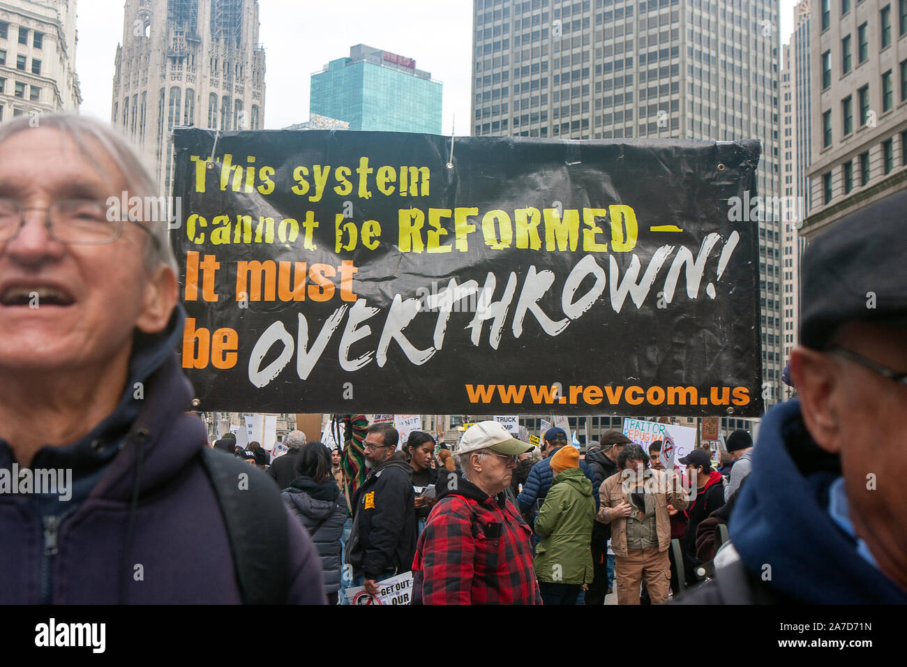 CHICAGO, ILLINOIS / USA - OCTOBER 28, 2019: Protesters march outside the Trump Tower at the 'Get Out of Our House' Protest Rally Stock Photo