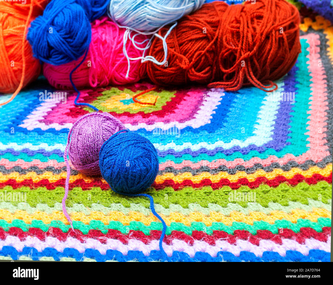 The Multicolored Yarn Used For Knitting Clothes Stock Photo, Picture and  Royalty Free Image. Image 18766603.