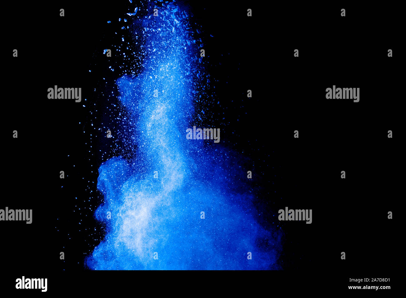 Blue color dust particles splash cloud on black background.Color powder ...