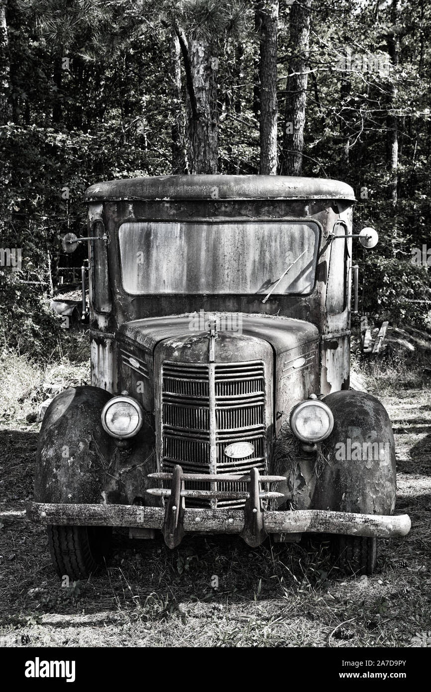 White, GA / USA - October27, 2018 - An Old Mack Truck Sitting in a Field at a Junk Yard Stock Photo