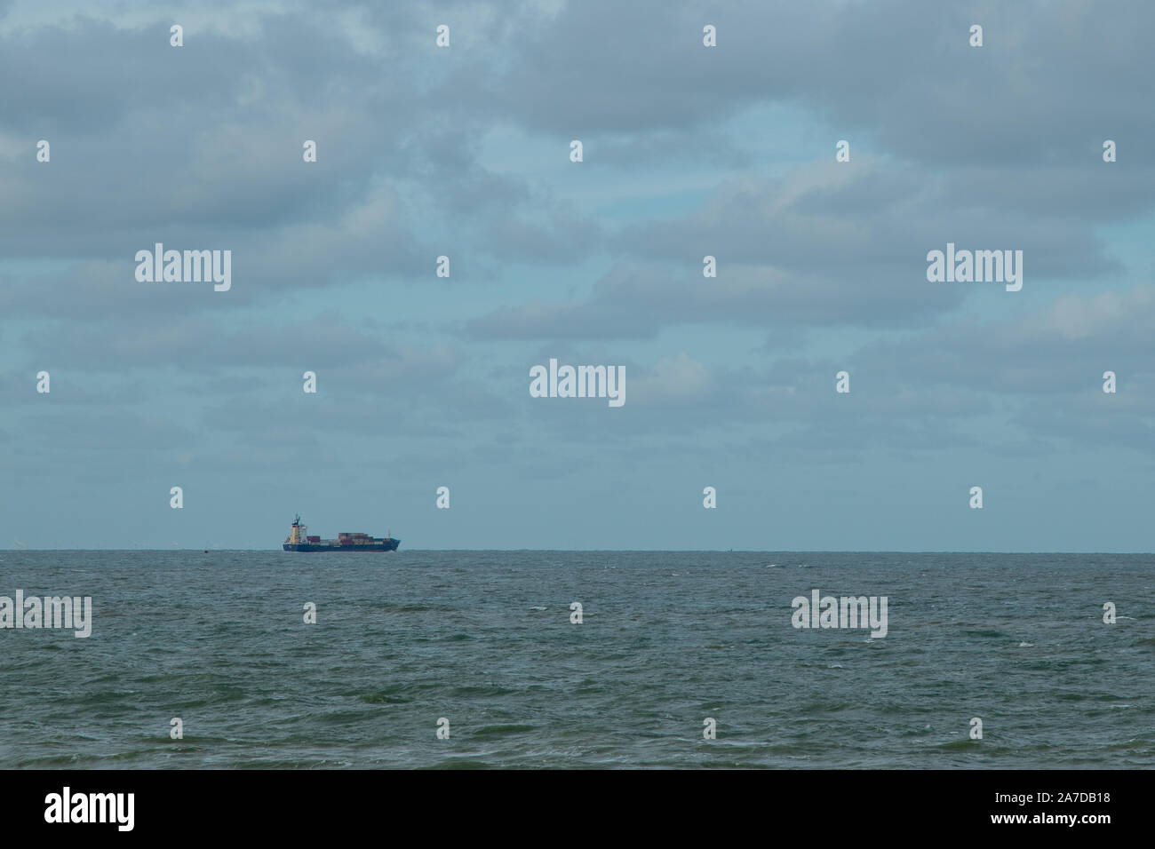 ship at the horizon of the north sea Stock Photo - Alamy