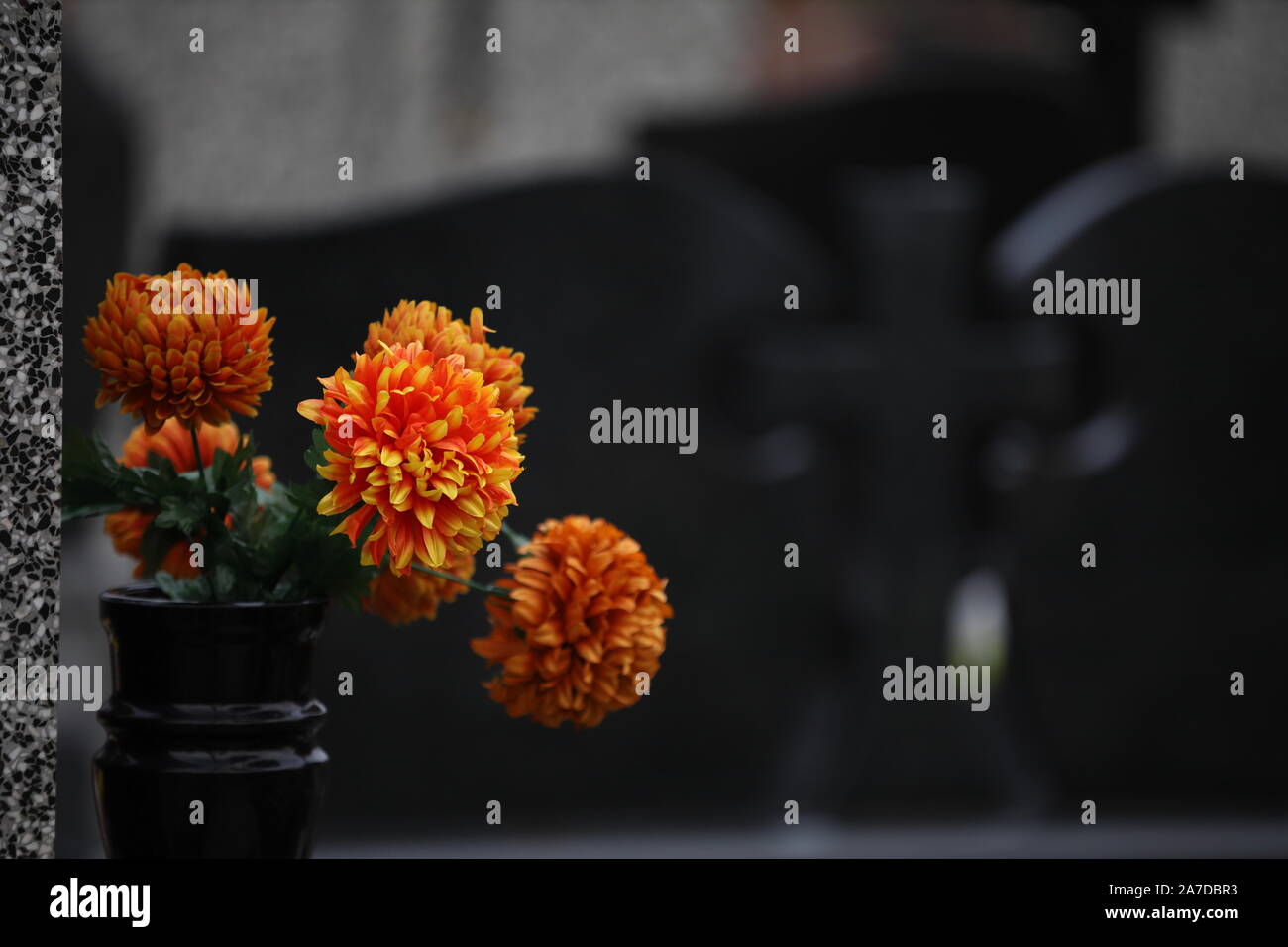 flowers on the grave, cemetery,background Stock Photo Alamy