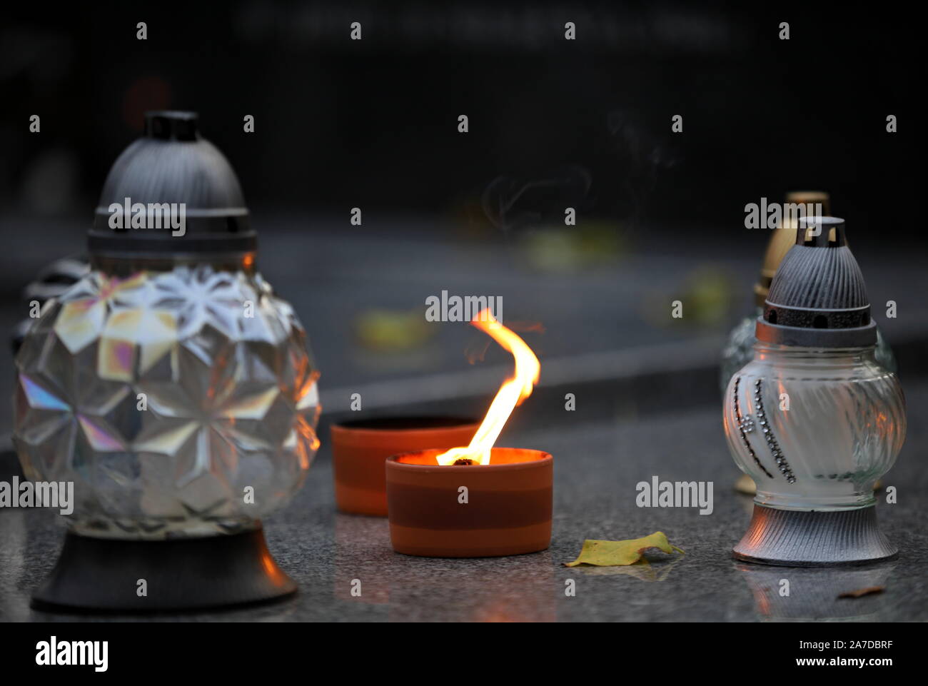 cemetery,candles at the cemetery Stock Photo - Alamy