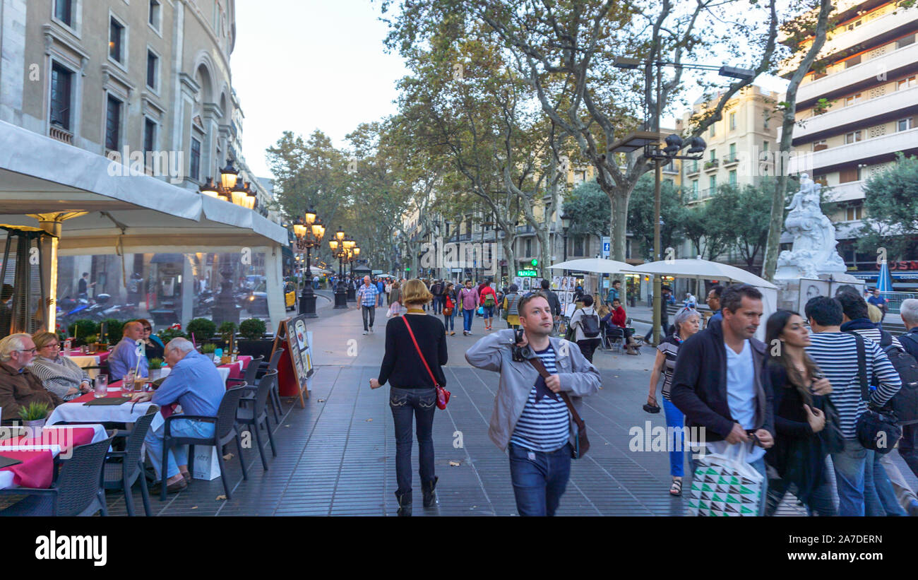 The Spanish poet Federico García Lorca once said that La Rambla was "the only street in the world which I wish would never end." Stock Photo