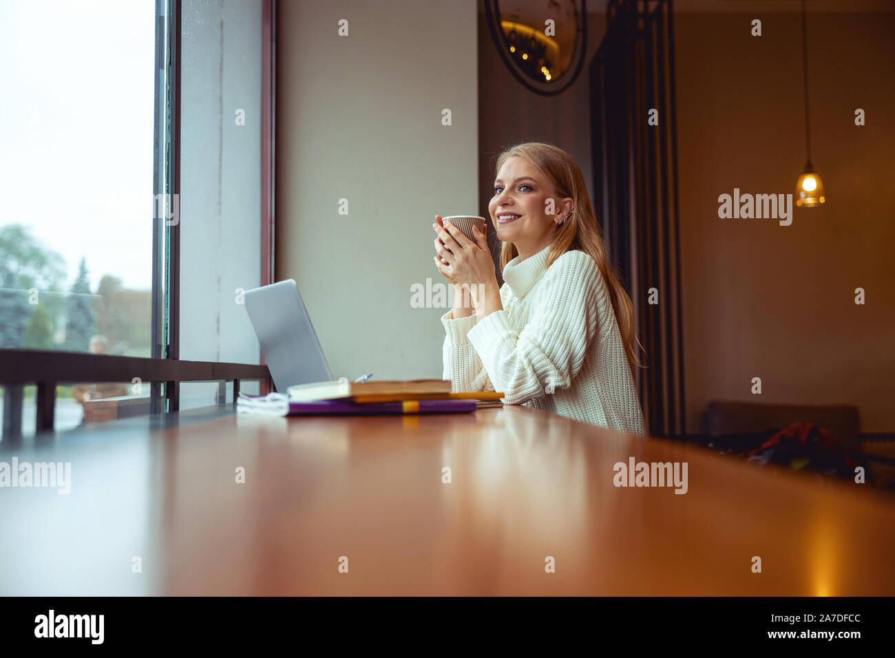 Woman elbows table hi-res stock photography and images - Alamy