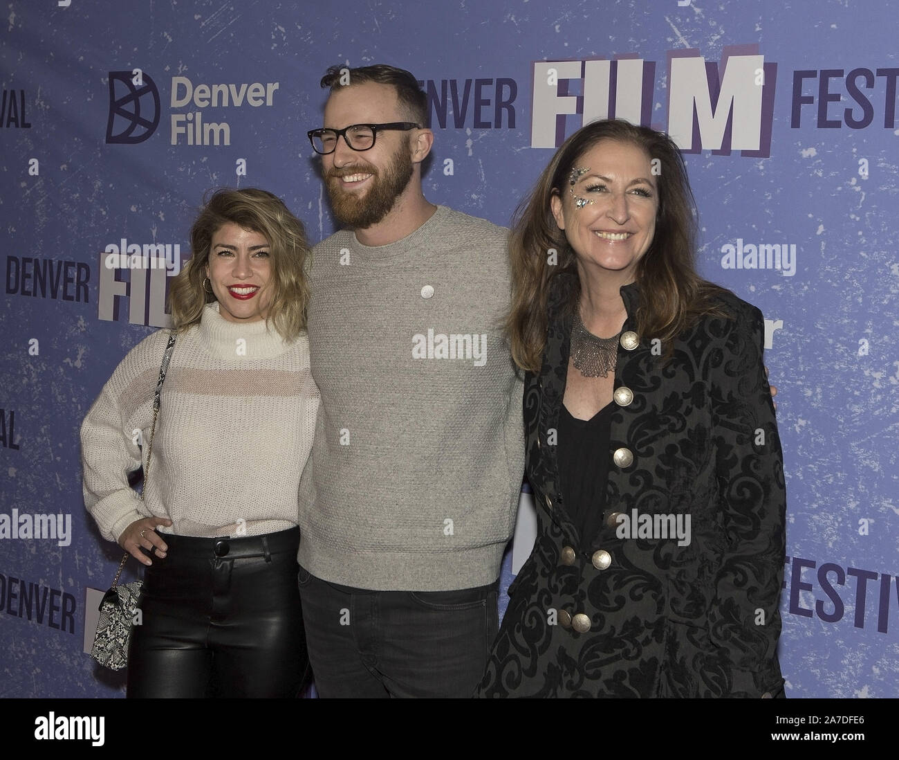 October 31, 2019, Denver, Colorado, U.S: BRODA LEE, left, CALEB WARD, middle, MARY-LYN CHAMBERS, right, of the film Krzysztof Kieslowski Jury during the Red Carpet for the Opening of the Denver Film Festival Thursday night at the Temple Buell Theater in Denver CO. (Credit Image: © Hector Acevedo/ZUMA Wire) Stock Photo