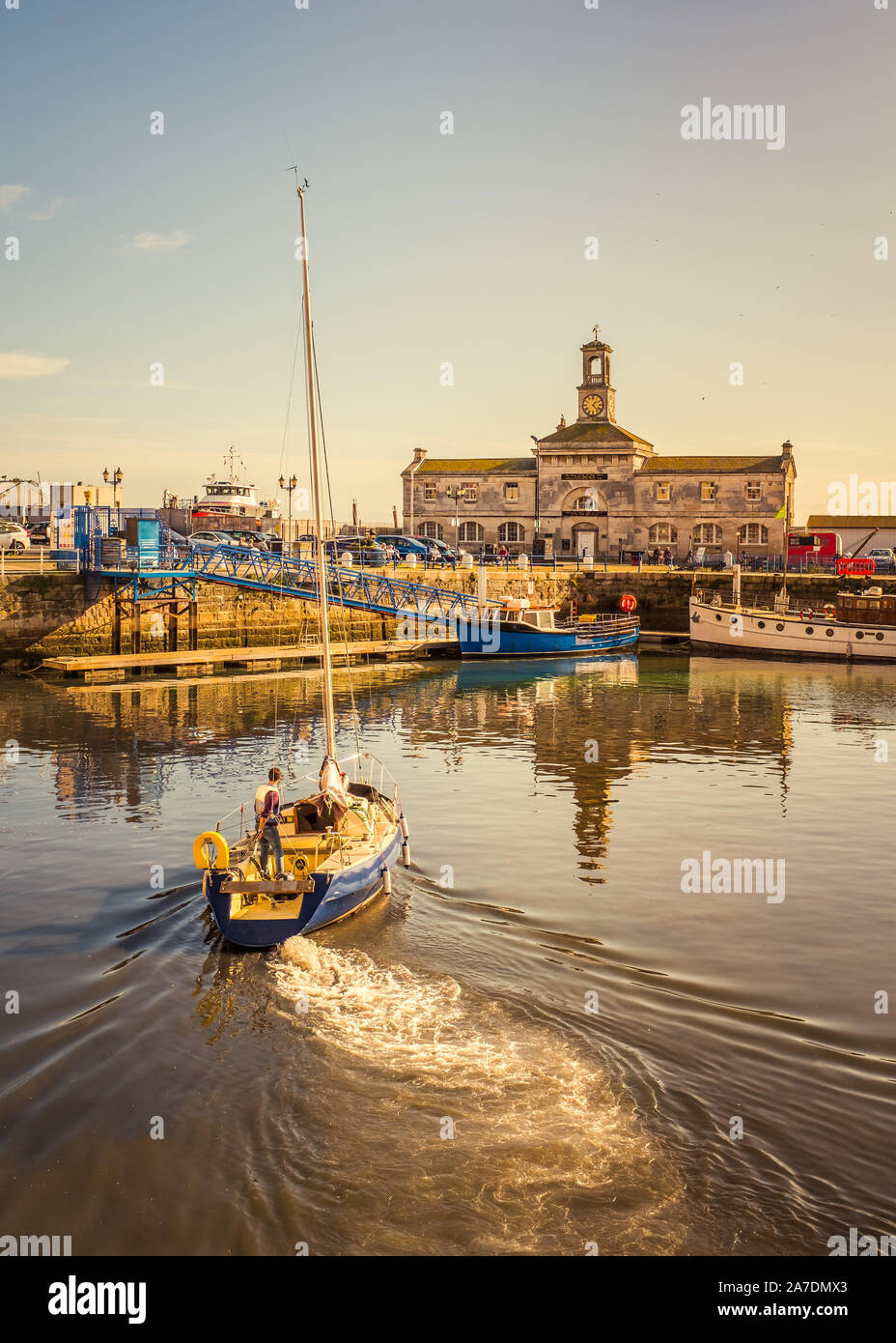 Yacht sailing to its mooring in Ramsgate Royal harbour, the historic ...