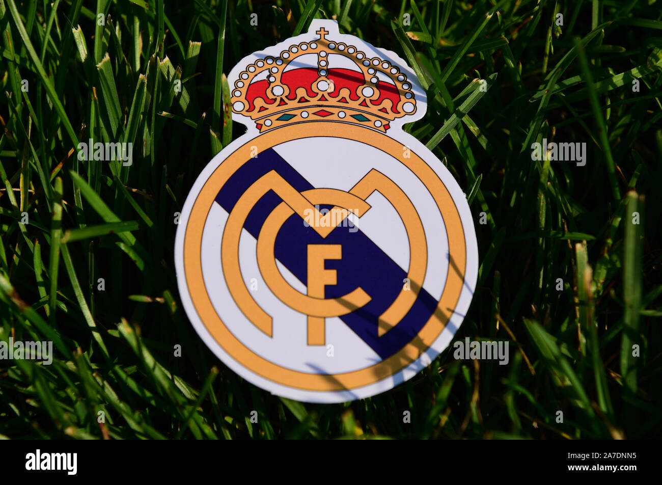 September 6, 2019 Istanbul, Turkey. The emblem of the Spanish football club Real Madrid on the green grass of the football field. Stock Photo