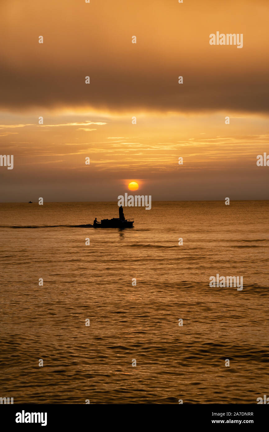 Fishermen boat silhouette hi-res stock photography and images - Alamy