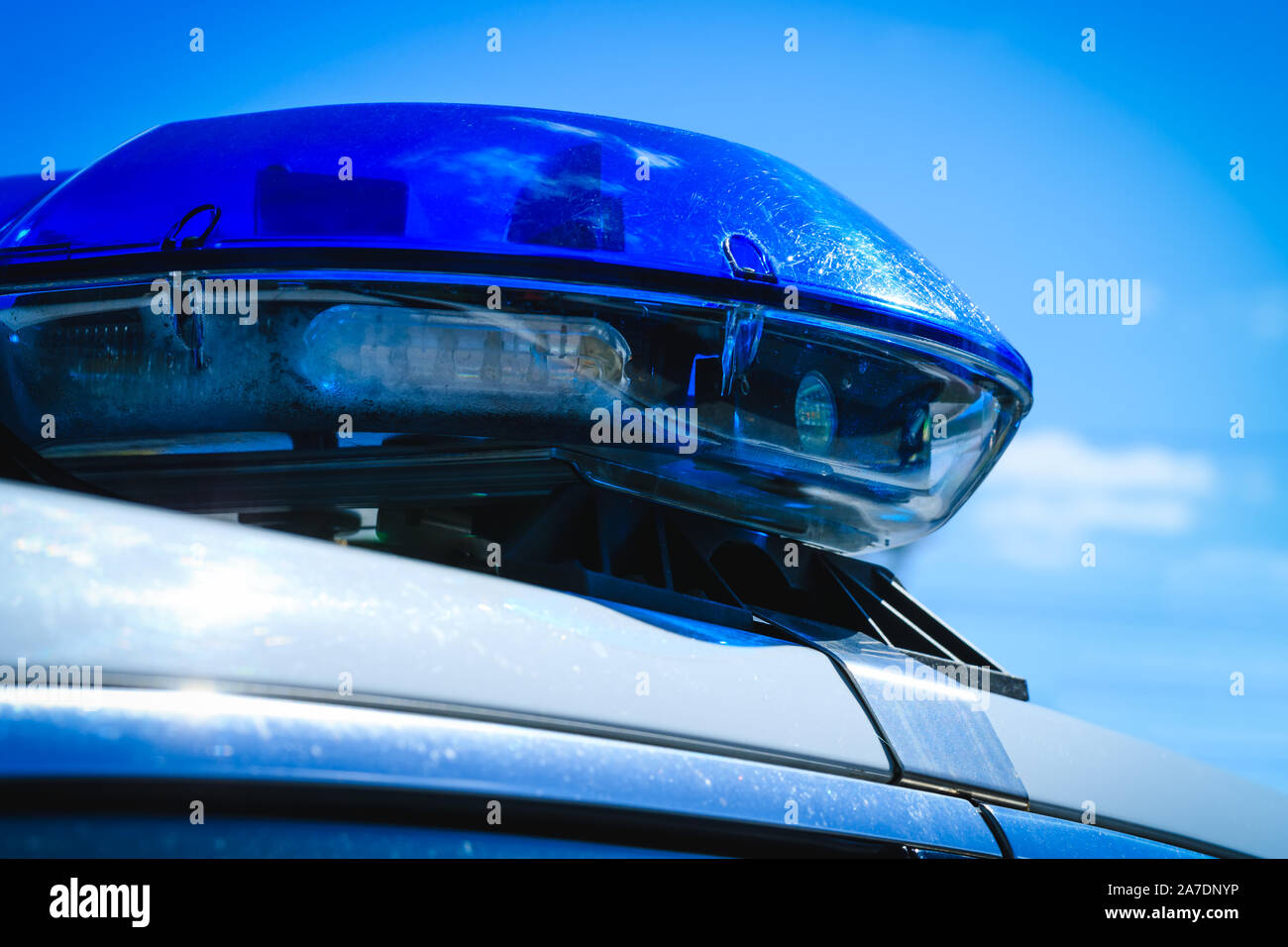 Blue flash lights on top of vehicle for urgent situation. Emergency or police car with the siren lights off in full activity. Canadian or American pol Stock Photo