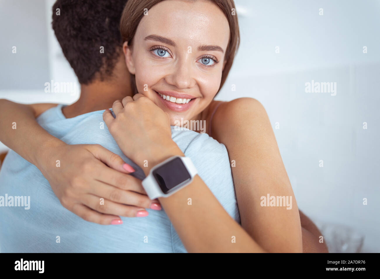 Portrait of happy girl is looking at camera Stock Photo - Alamy