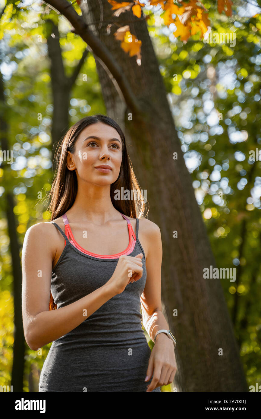 Woman being happy to keep hersel fit Stock Photo