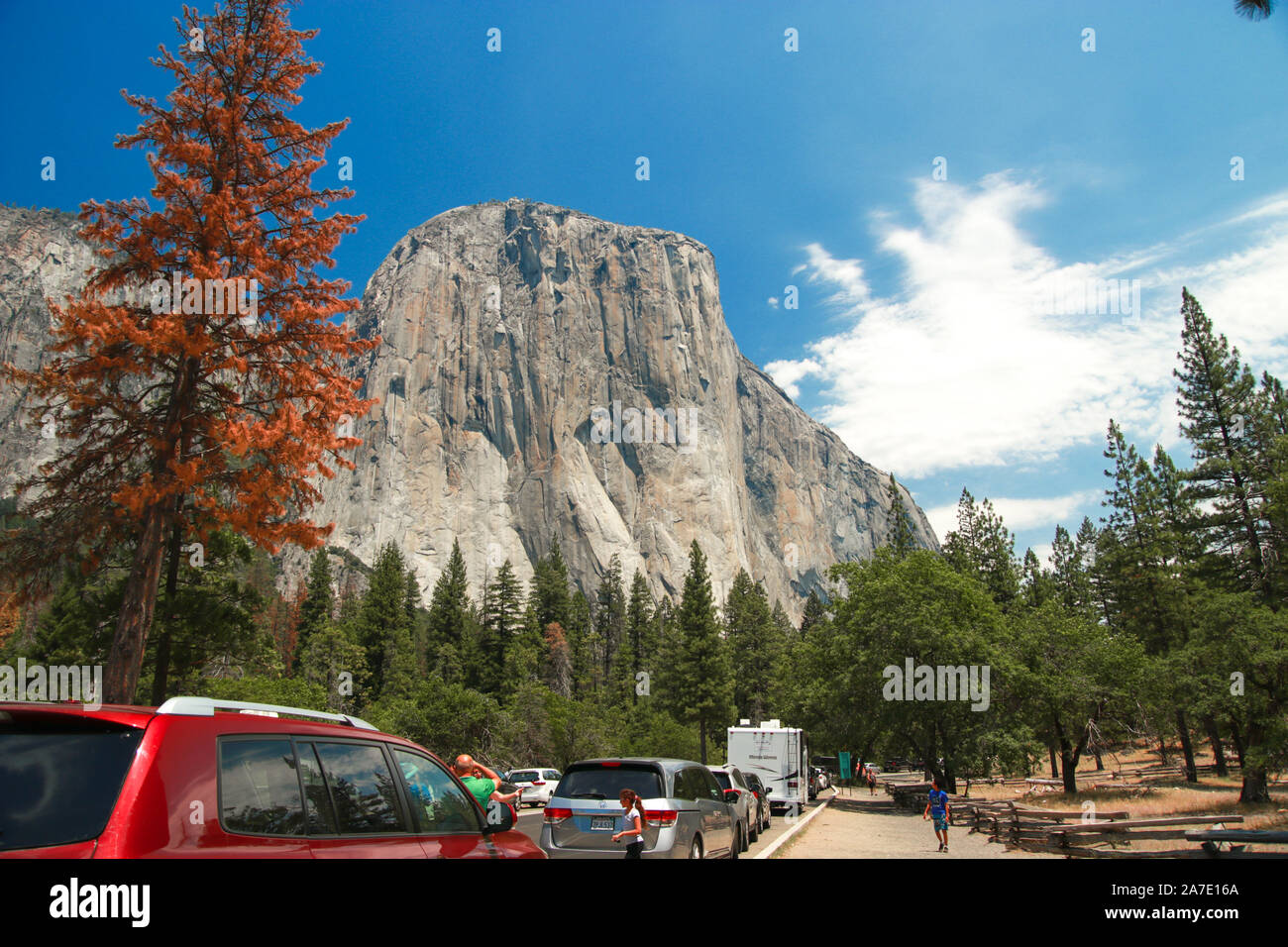 Yosemite National Park, California, USA - July 10, 2017: Tourists on their way to Yosemite Valley, passing by El Capitan - granite rock known for its Stock Photo