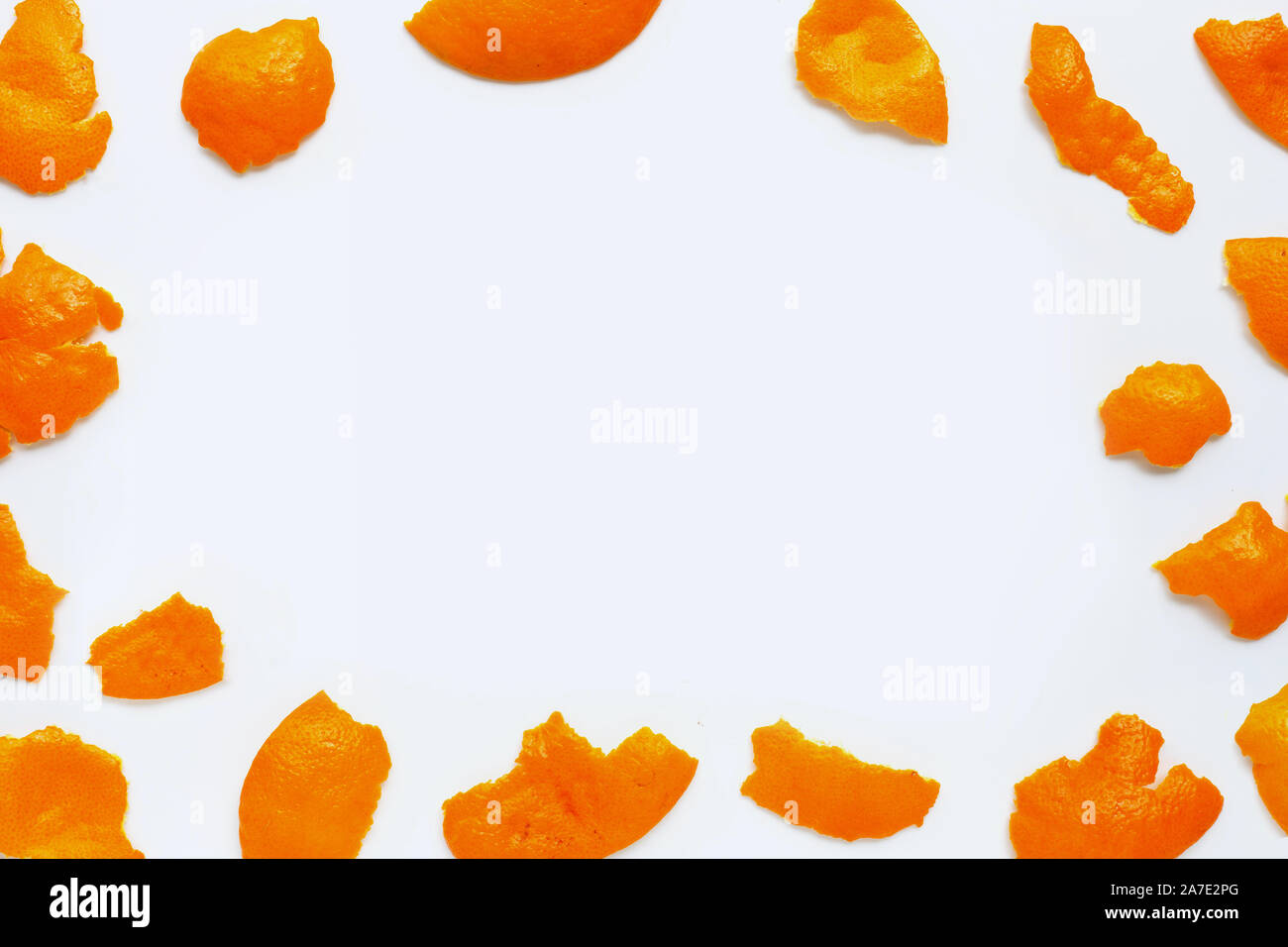 Frame made of mandarin peel isolated on white background Stock Photo