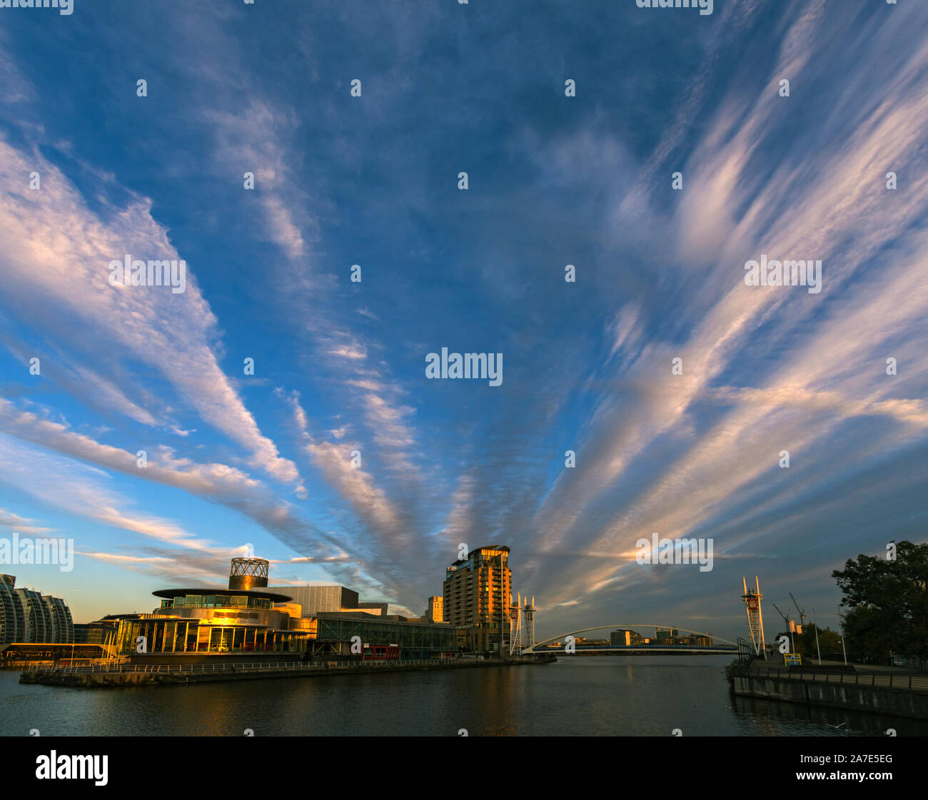 Sunset on the Lowry Arts Centre and the Imperial Point apartment block, Salford Quays, Manchester, England, UK Stock Photo