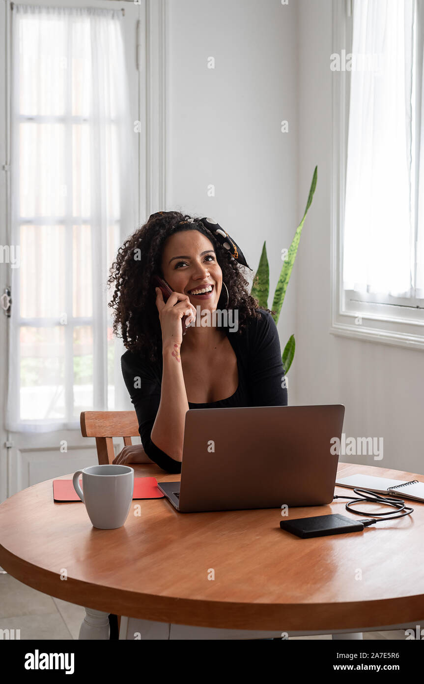 Professional young latin woman hi-res stock photography and images - Alamy