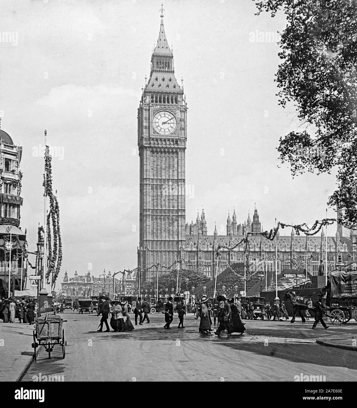 Vintage black and white photograph taken in 1911 showing Big Ben and The Houses Of Parliament in London, with flags and decorations for the Coronation Of King George V. Stock Photo
