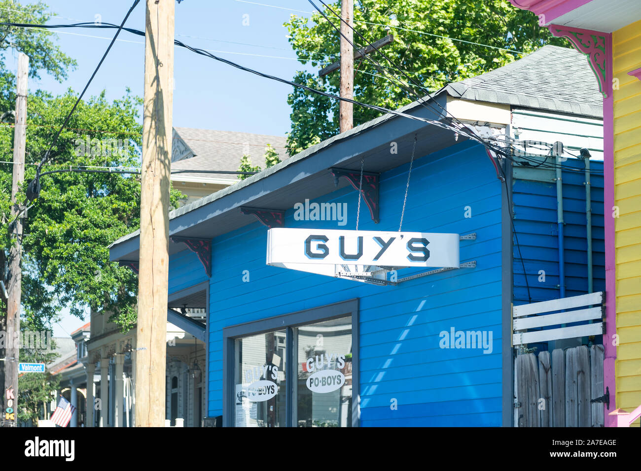 New Orleans, USA - April 23, 2018: Magazine street in Garden district in Louisiana town city with sign for Guy's Po-Boys famous food shop restaurant s Stock Photo