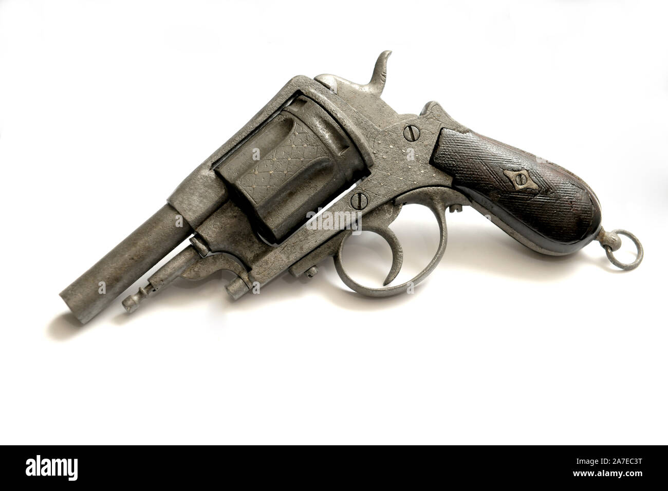 Old wooden flare gun isolated on white background. ?ld revolver gun with wooden handle Stock Photo