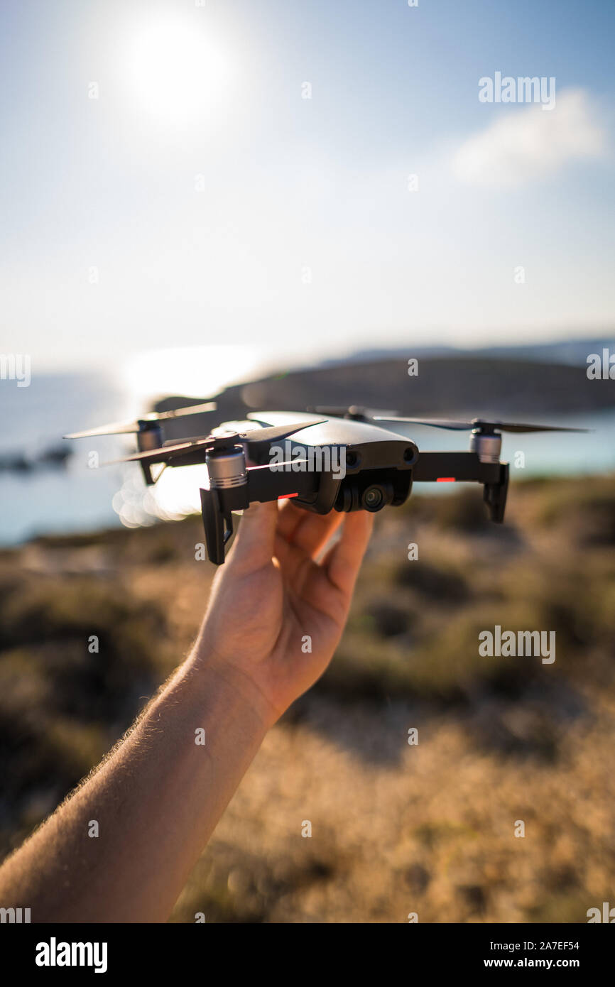 Holding Drone Hovering Travel Location Coastal Photography Equipment Quadrocopter New Stock Photo