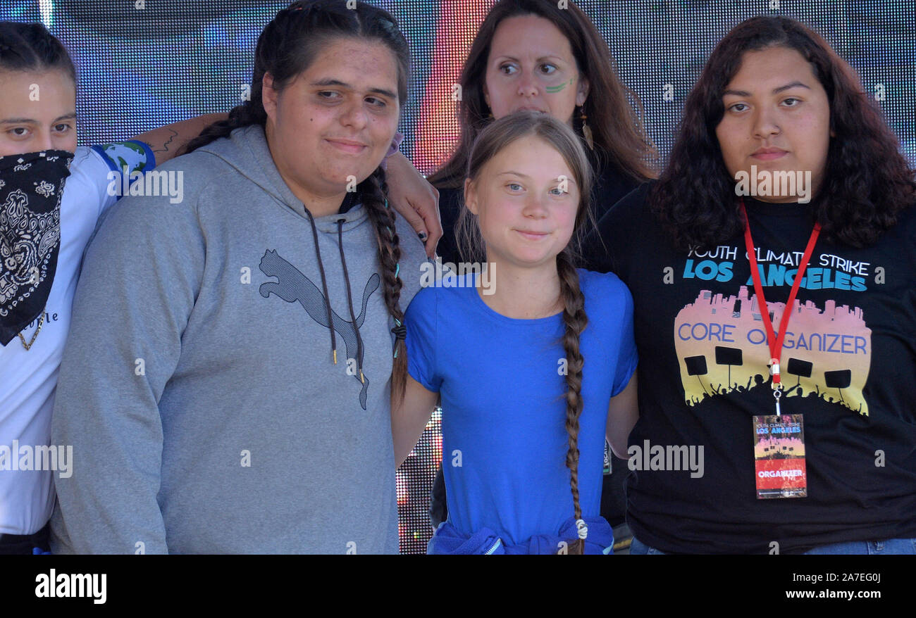 Los Angeles, USA. 1st Nov 2019. Swedish teen climate activist Greta Thunberg appears on stage with organizers of Youth Climate Strike Los Angeles, joining with protesters in a demonstration outside Los Angeles City Hall to protest fossil fuel production in California on Friday, November 1, 2019. Thunberg, 16, said her generation has a responsibility to demand from.elected officials environmental policy reforms that ban oil and gas drilling, from which carbon emissions have been identified as a primary source of the planet's annual rising temperatures. Credit: UPI/Alamy Live News Stock Photo