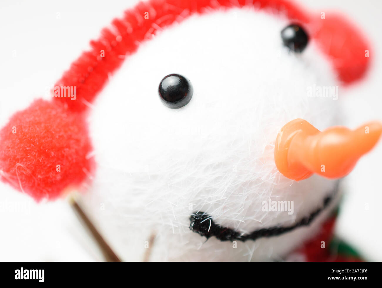 Adorable closeup profile of smiling snowman Stock Photo