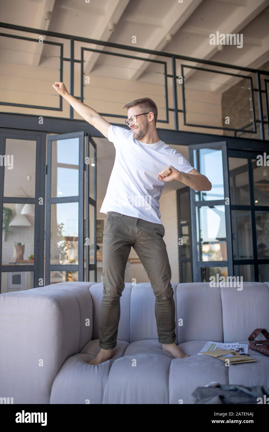 Businessman feeling positive while having rest at home Stock Photo