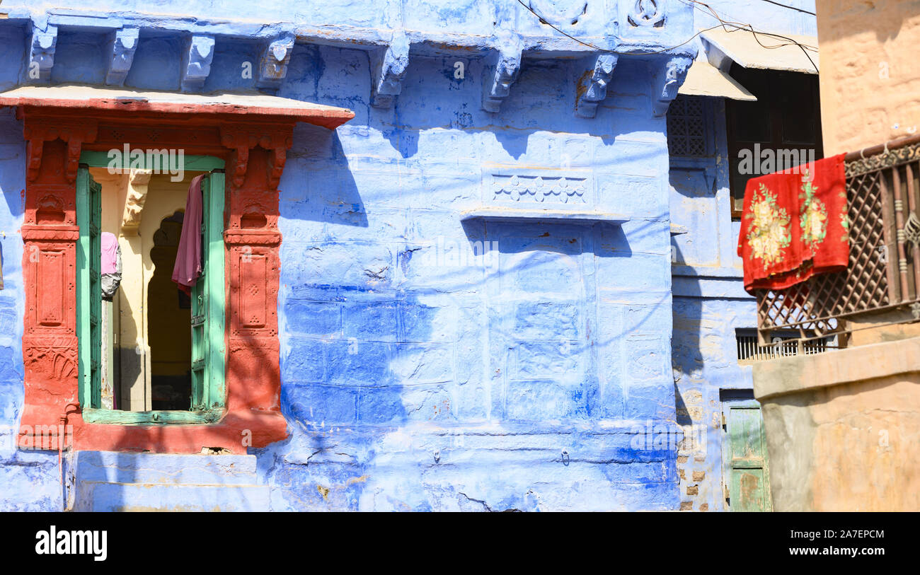 Stunning view of a colorful window of a house among the narrow streets of the blue city of Jodhpur, Rajasthan. Stock Photo