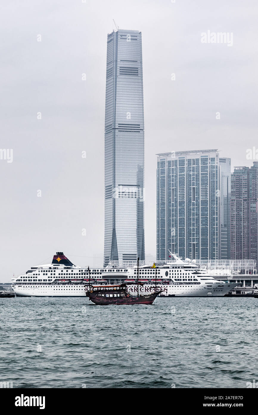 The International Commerce Center looming over Hong Kong Harbour on the Kowloon Peninsula. Hong Kong Stock Photo