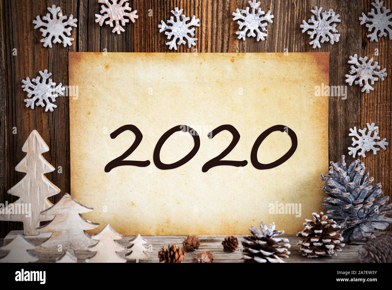 Old Paper With White Christmas Decoration, Text 2020 Stock Photo